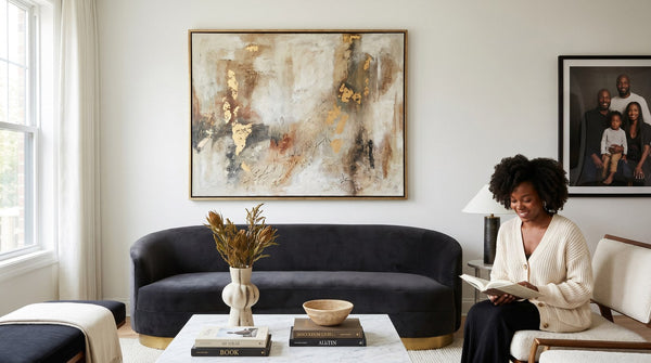 Editorial living room for How to Choose Wall Art That Looks Expensive with warm natural light and sophisticated contemporary styling.